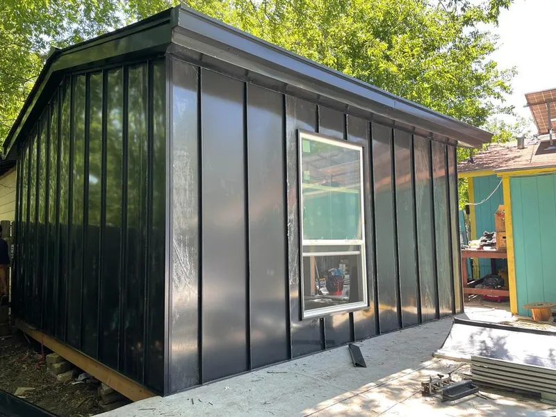 Black standing seam metal wall panels for Roof Inspection in Van Buren