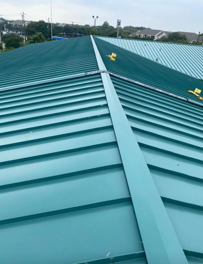 Green commercial metal roof ridge and valley for Metal Roof Repair in Van Buren